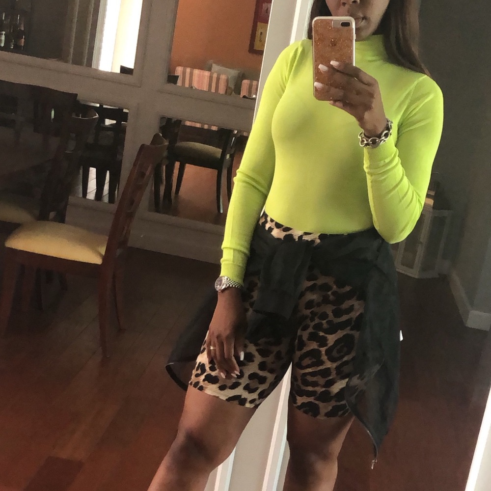 Biker shorts and neon bodysuit